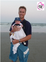 Daddy wearing baby