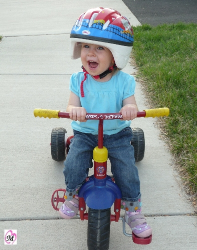 1 Year old riding tricycle