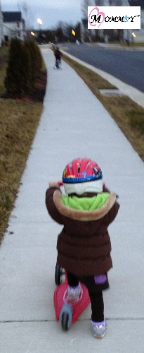 2 year old riding scooter