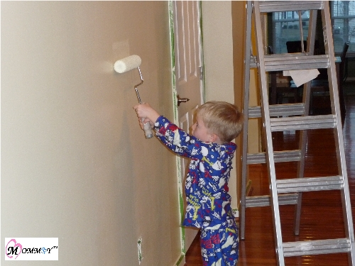 4 year old painting  house