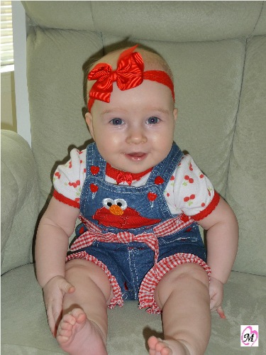 baby girl in elmo