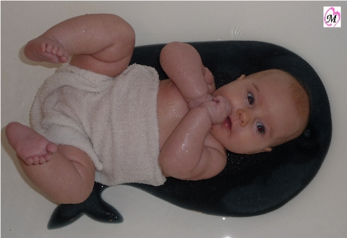 Baby getting bath