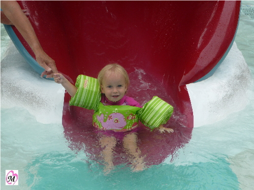 1 year old on water slide