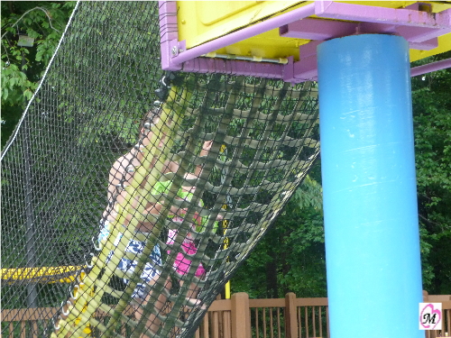 1 year old on climbing net