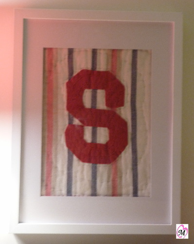 framed letter from quilt