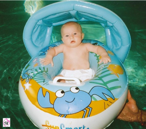 infant in swim raft
